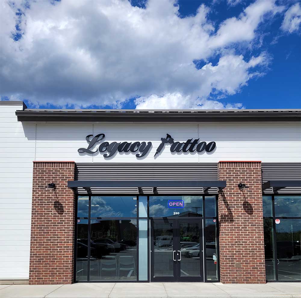 Legacy Tattoo| Front of store with blue sky and clouds