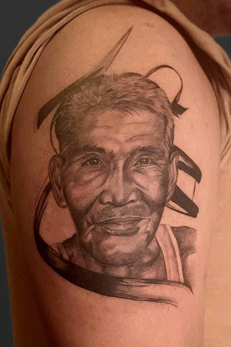 Legacy Tattoo| Black and grey realism, portrait tattoo of an elderly man
