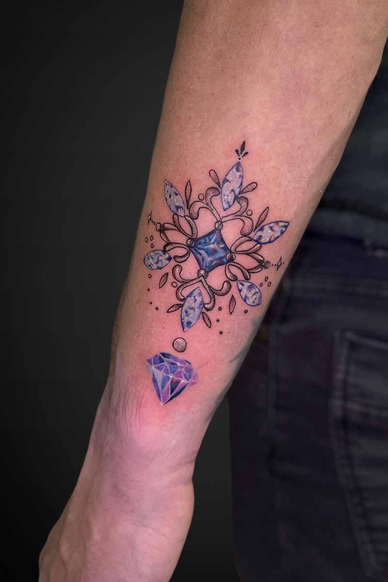 Legacy Tattoo| Colour, realism tattoo of ornamental, purple jewels