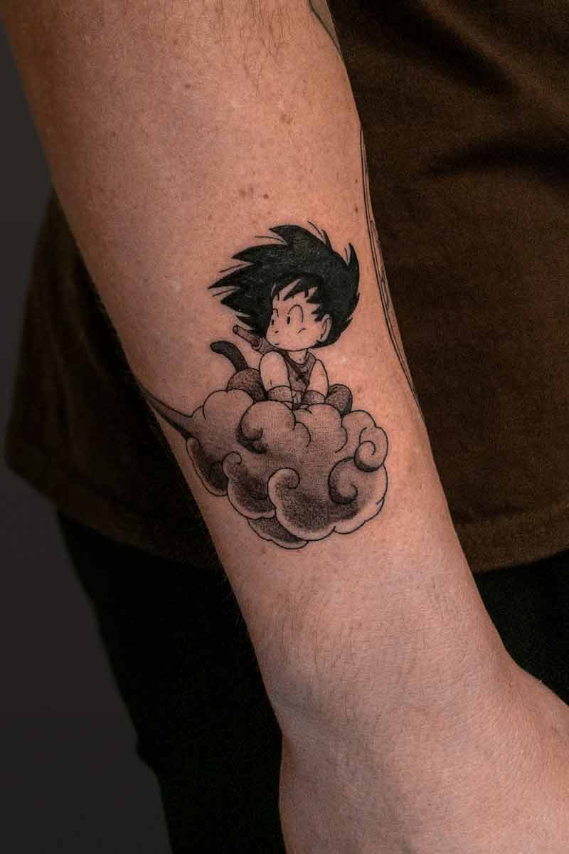 Legacy Tattoo- Anime tattoo of kid Goku sitting on a cloud