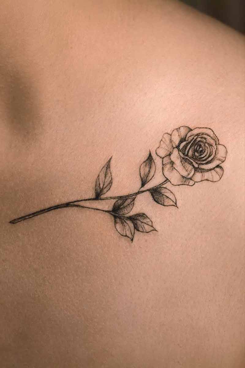 Legacy Tattoo| Black and grey, fineline tattoo of a rose stem
