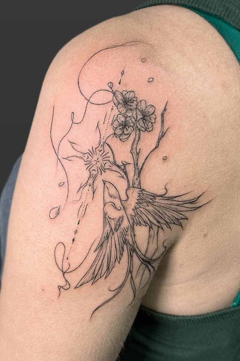 Legacy Tattoo| Fineline tattoo of ornamentals, a bird, flowers and lines