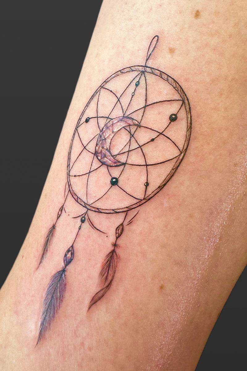 Legacy Tattoo| Fineline tattoo of a dreamcatcher with gems
