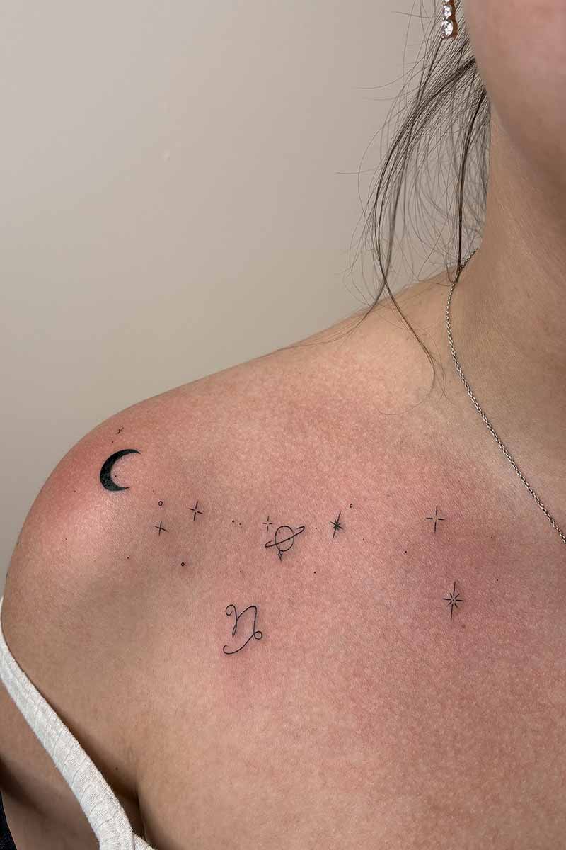 Legacy Tattoo| Walk-in Tattoo| Fineline tattoo of the moon, planet, stars and star sign