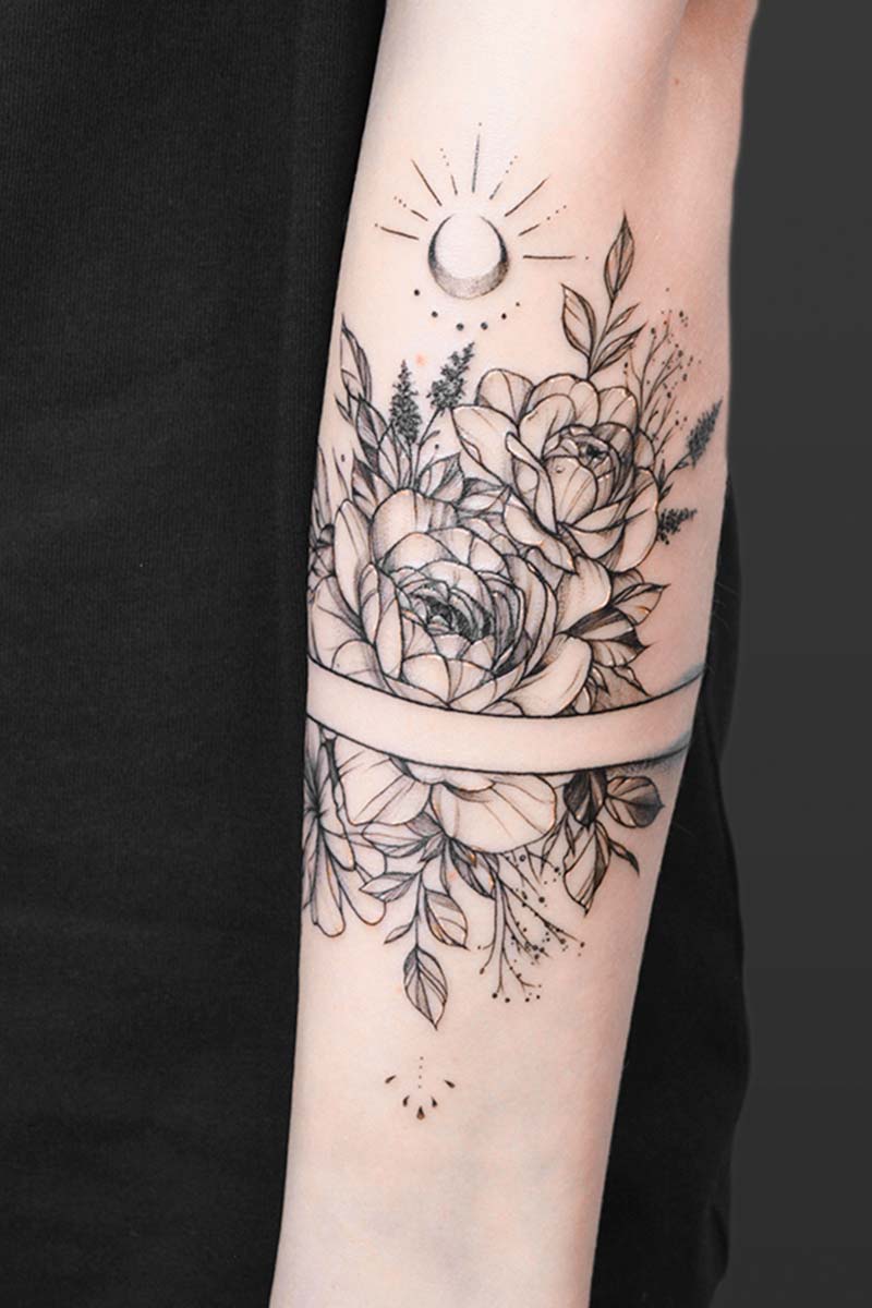 Legacy Tattoo| Fineline tattoo of peonies and foliage and straight lines as a band tattoo