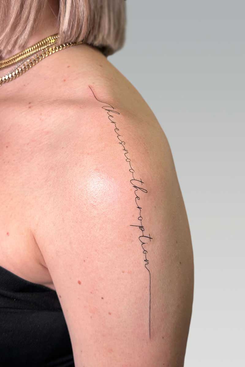 Legacy Tattoo| Walk-in Tattoo| Fineline tattoo of words going down the client's shoulder