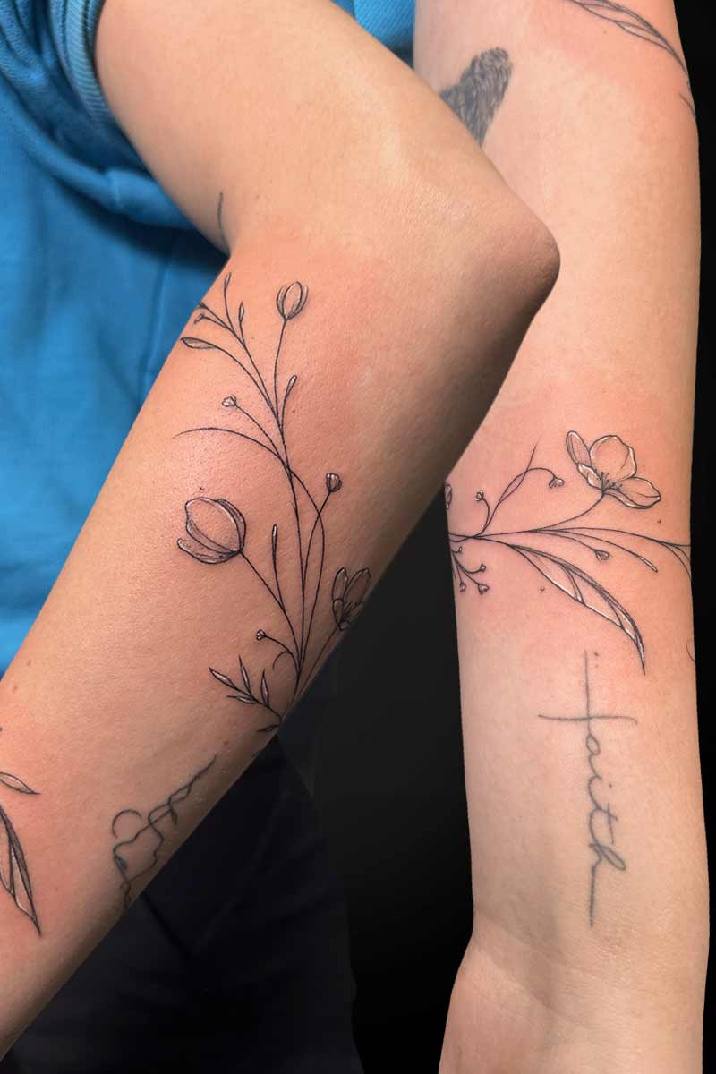 Legacy Tattoo| Fineline tattoo of floral wrap