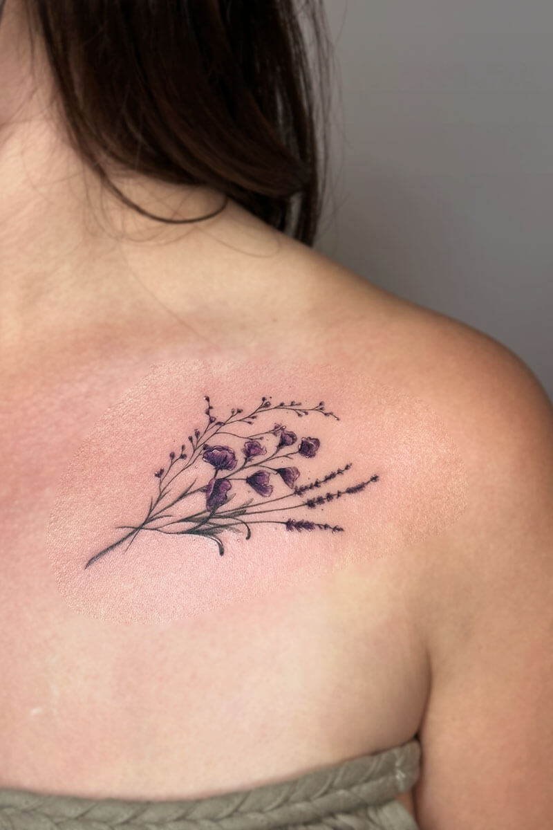 Legacy Tattoo| Microrealism, fineline tattoo of a simple bouquet of purple flowers