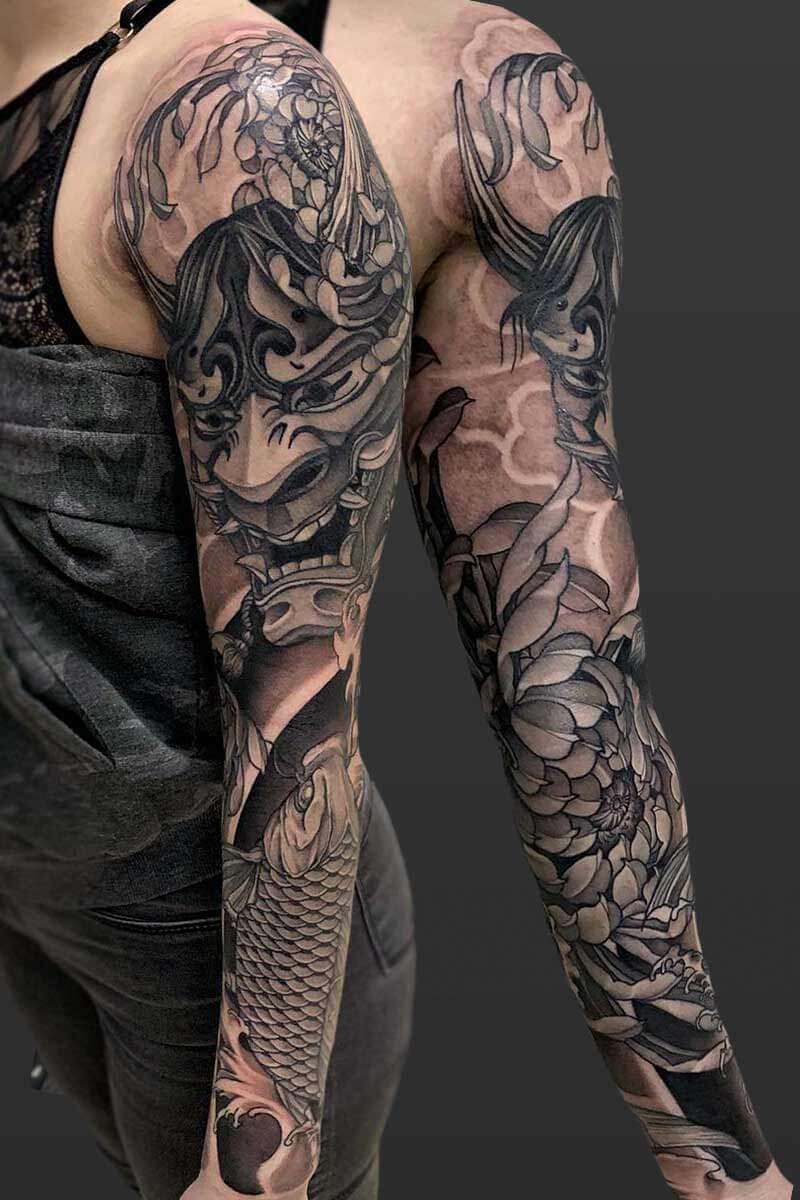 Legacy Tattoo| Japanese, Neotraditional tattoo sleeve of an oni mask, Japanese chrysanthemum, koi fish and waves