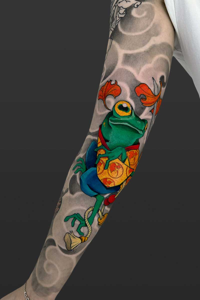 Legacy Tattoo| Neotraditional tattoo of a frog, wearing a robe and holding a sword