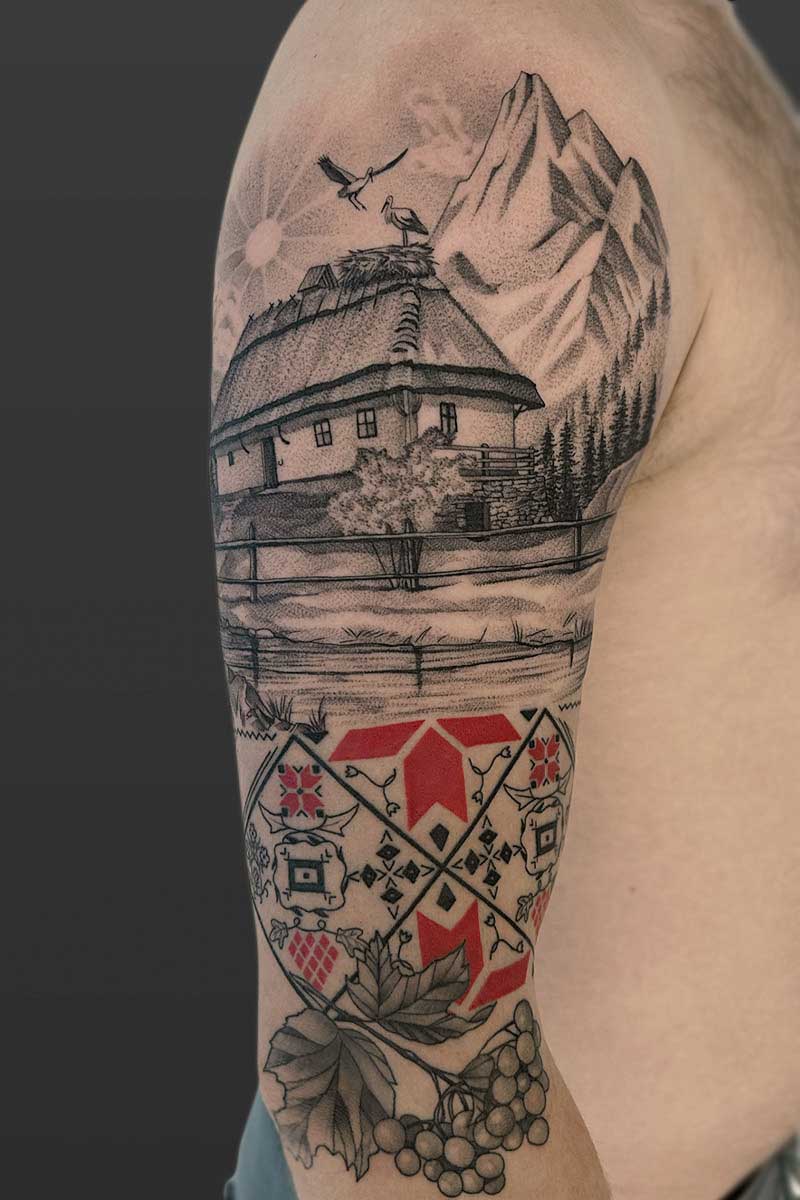 Legacy Tattoo| Realism tattoo of a house, mountains and Ukrainian patterns
