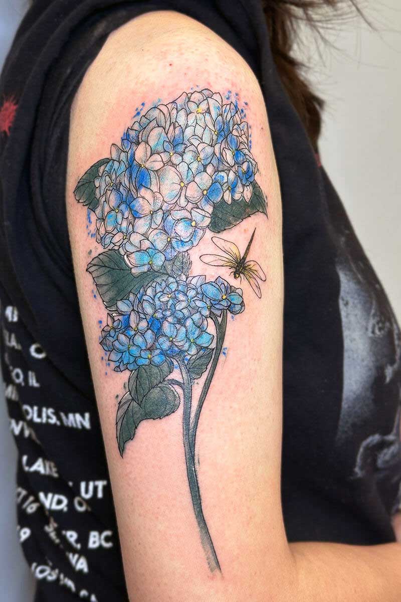 Legacy Tattoo| Fineline, watercolour tattoo of blue hydrangeas and a yellow dragonfly