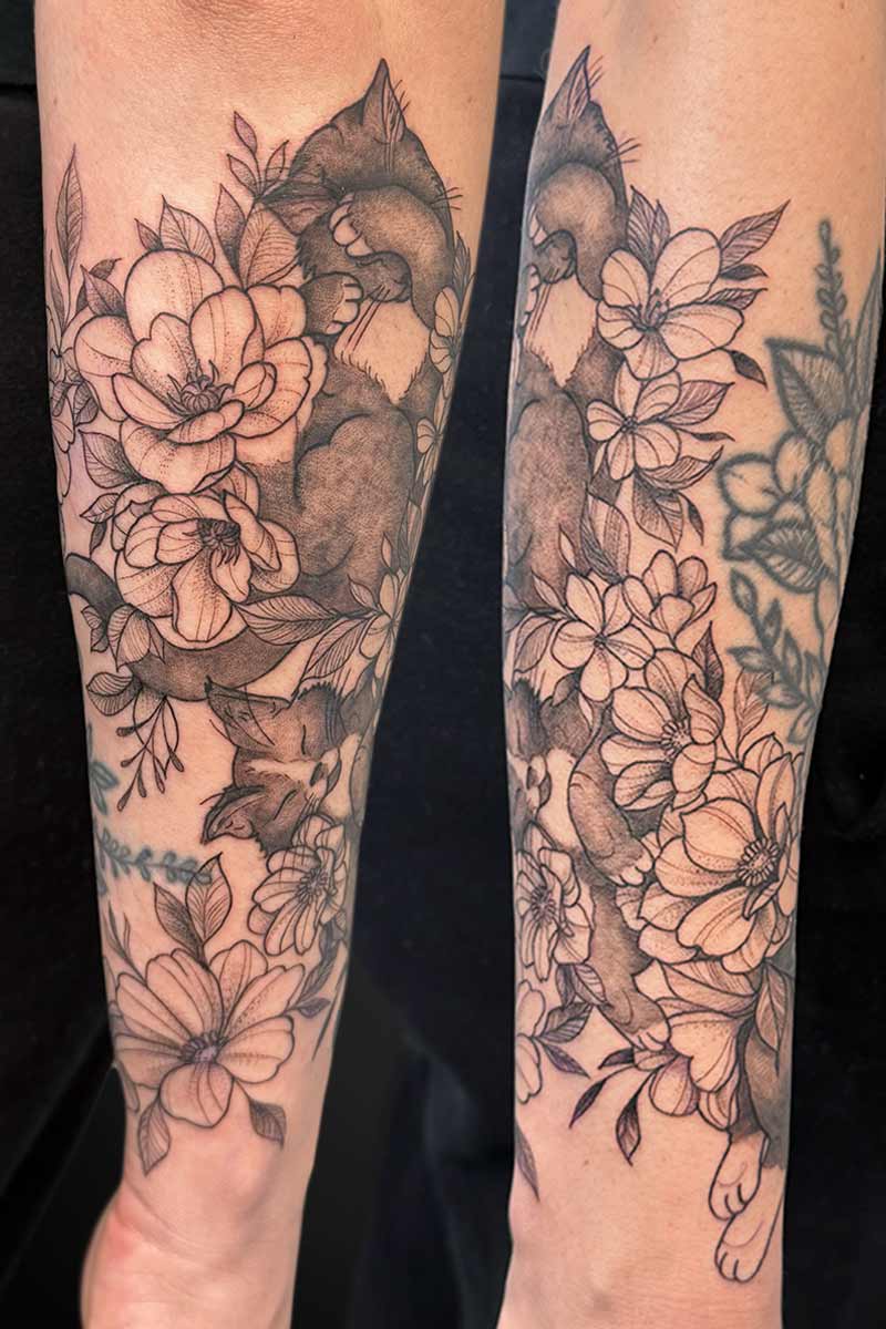 Legacy Tattoo| Black and grey tattoo of pet cats with fineline florals