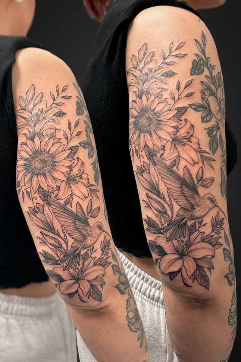 Legacy Tattoo| Fineline, floral tattoo of flowers and a hummingbird