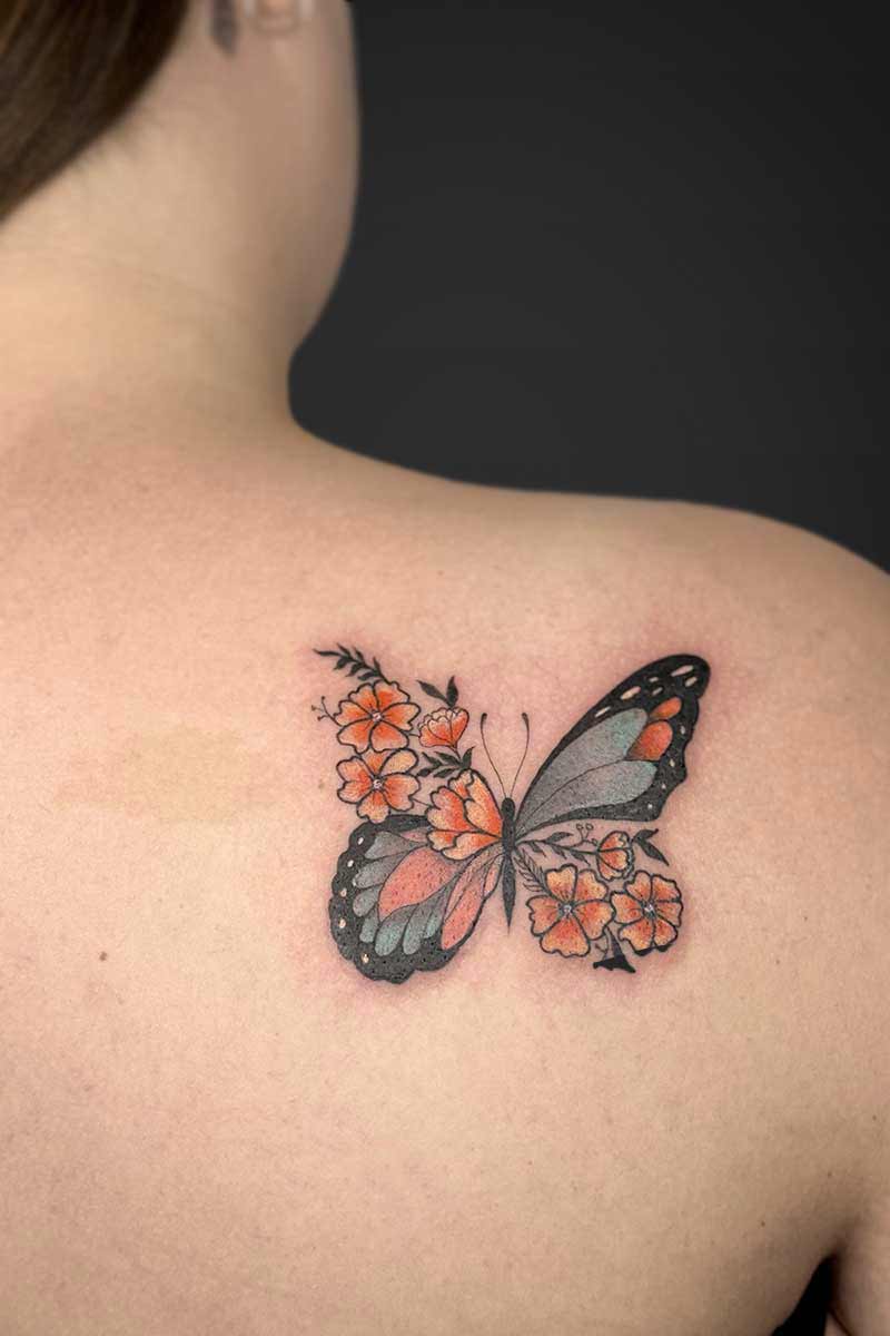 Legacy Tattoo| Walk-in Tattoo| Colour tattoo of a butterfly with floral wings