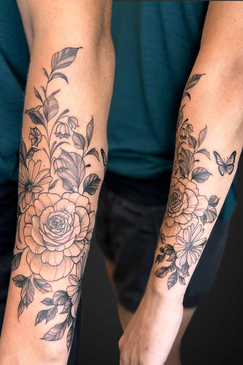 Legacy Tattoo| Fineline floral tattoo of flowers and a butterfly