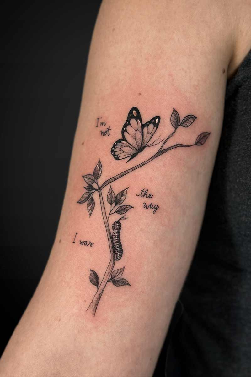 Legacy Tattoo| Black and grey tattoo of a butterfly, branch and caterpillar